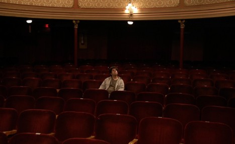 Sitting alone in the theatre-1-750x460